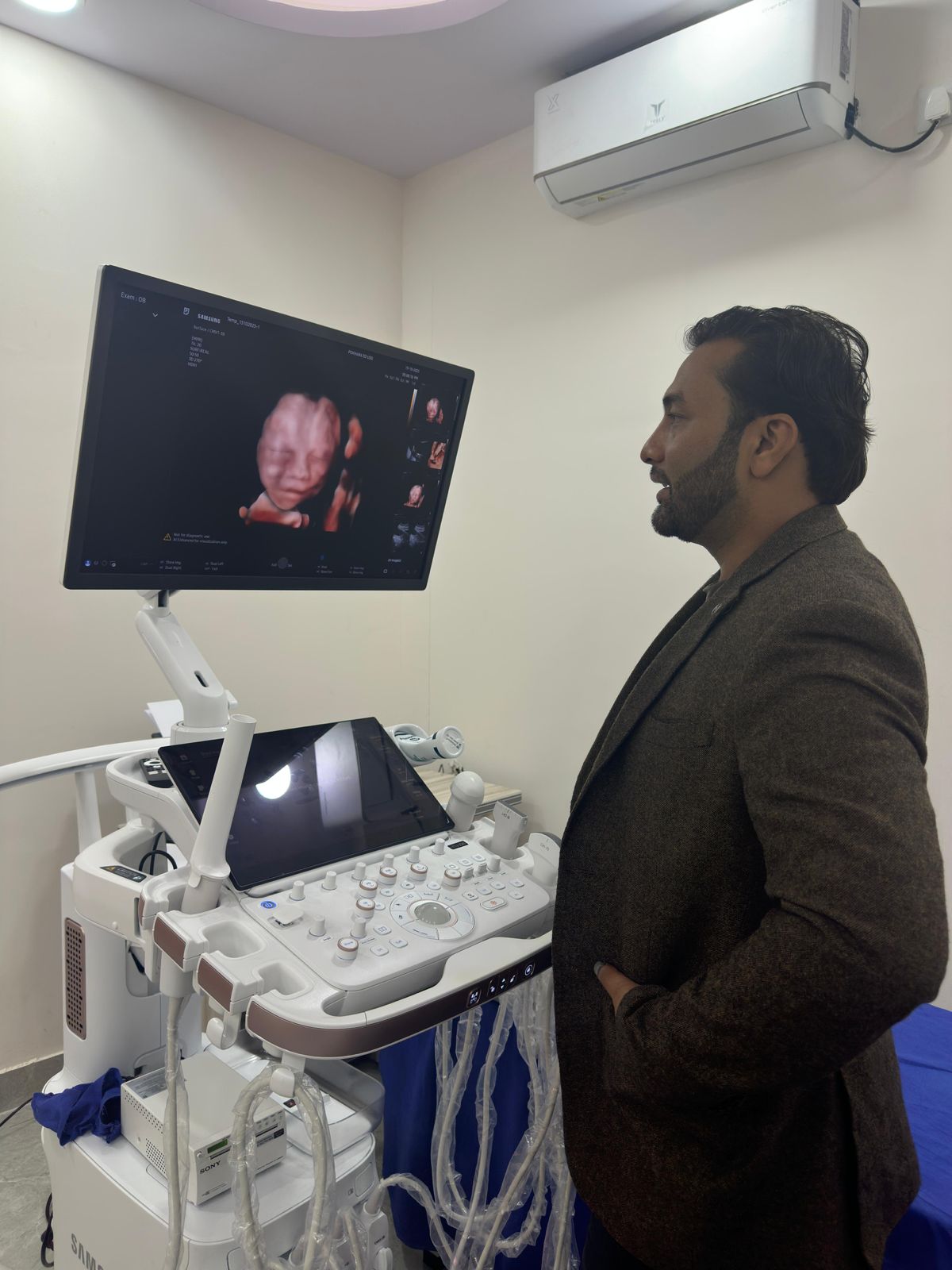 Dr. Khadka performing a detailed 5D ultrasound scan